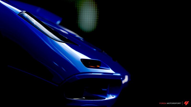 blue car in dark setting