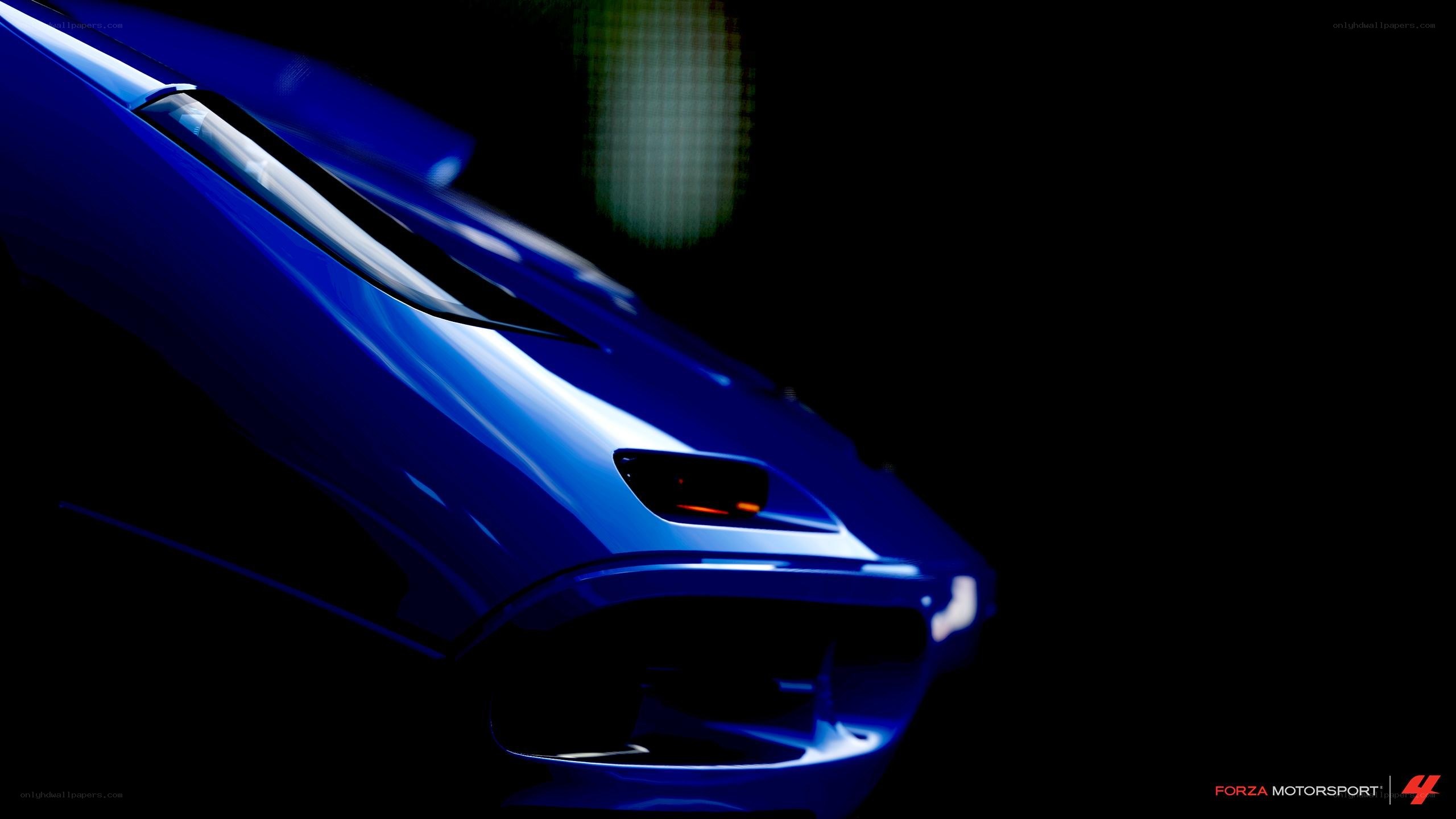 blue car in dark setting