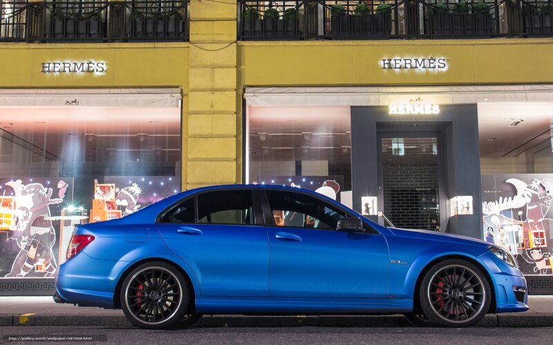 Blue car in front of Hermes
