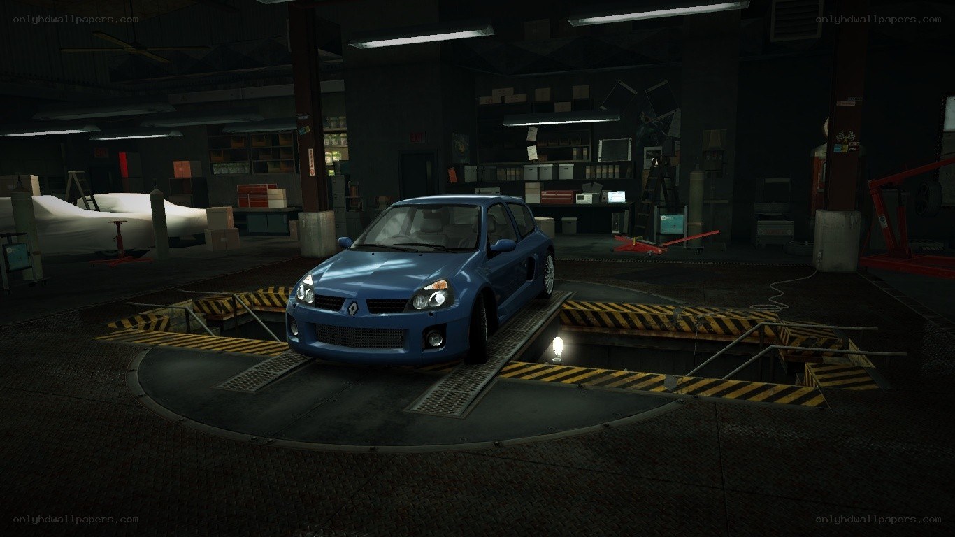 blue car in garage