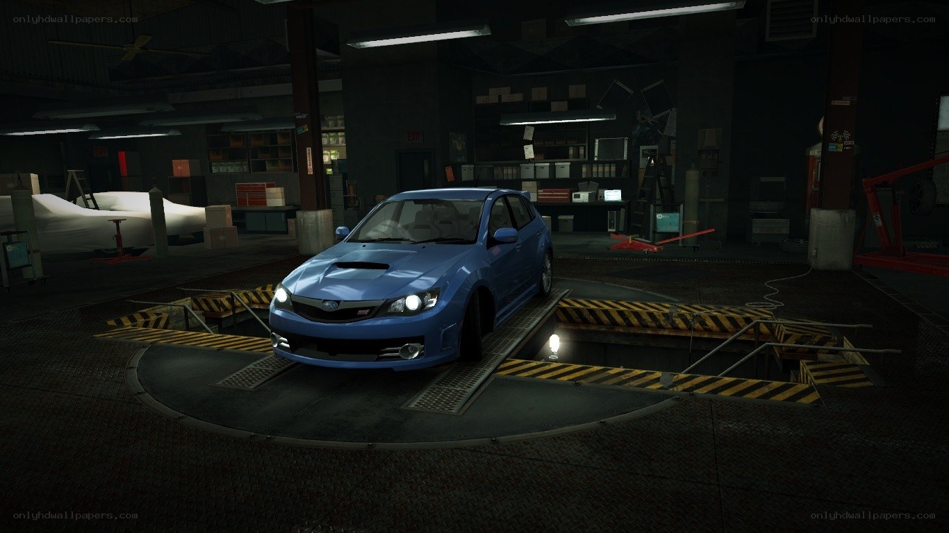 blue car in garage