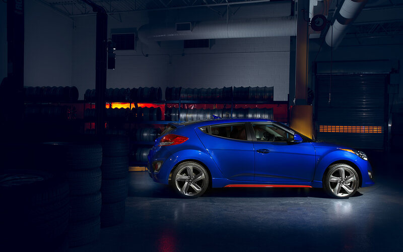 Blue Car in Garage — Dramatic