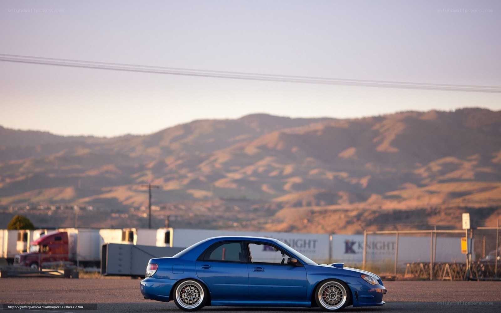 Blue car in industrial area
