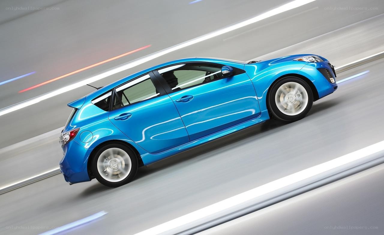 blue car in motion
