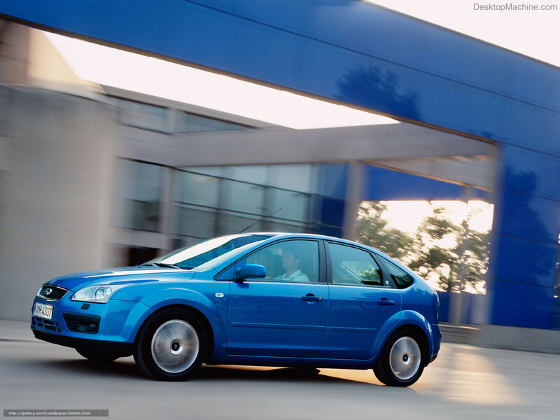 blue car in motion