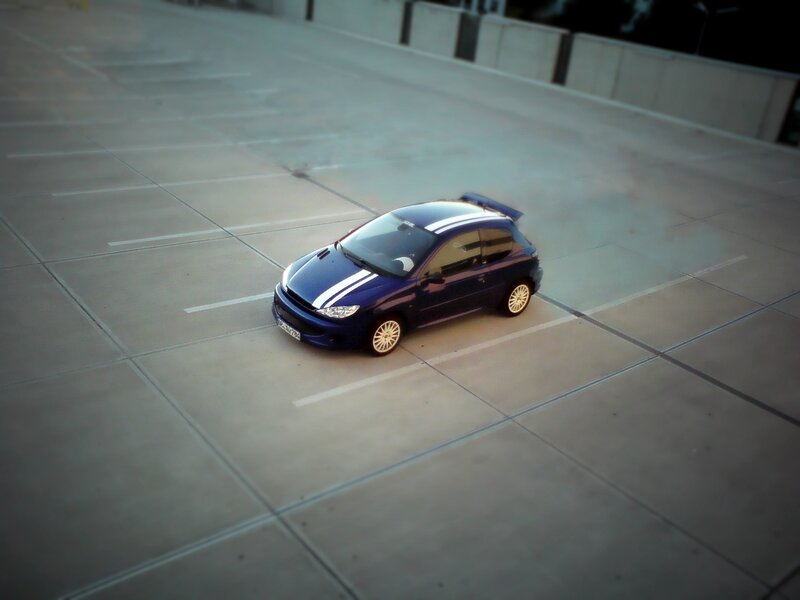 blue car in parking lot