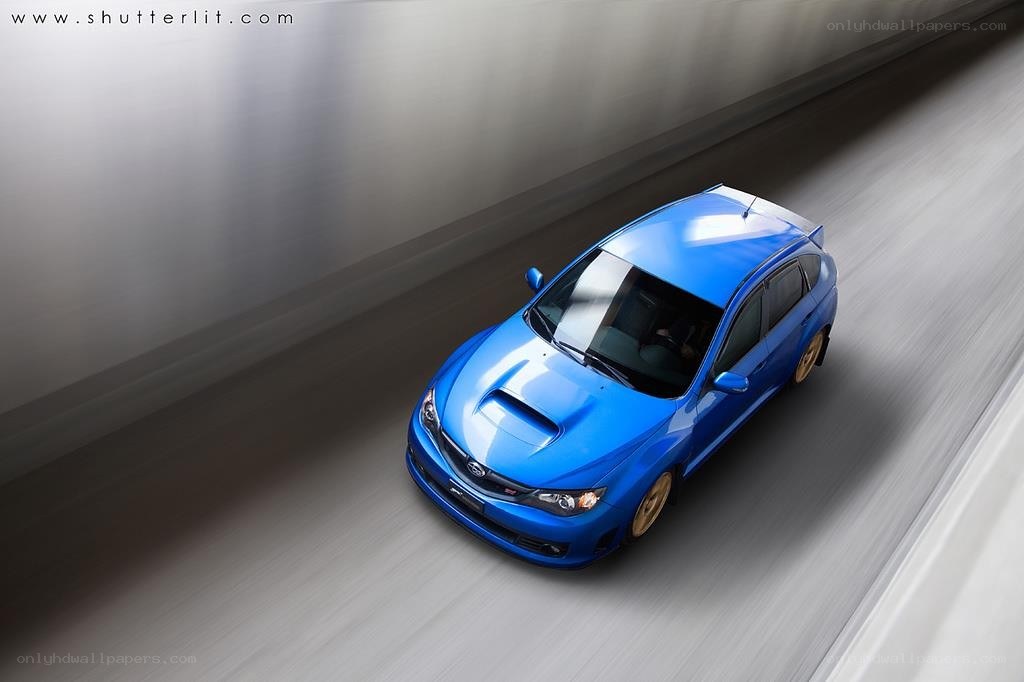 blue car in tunnel