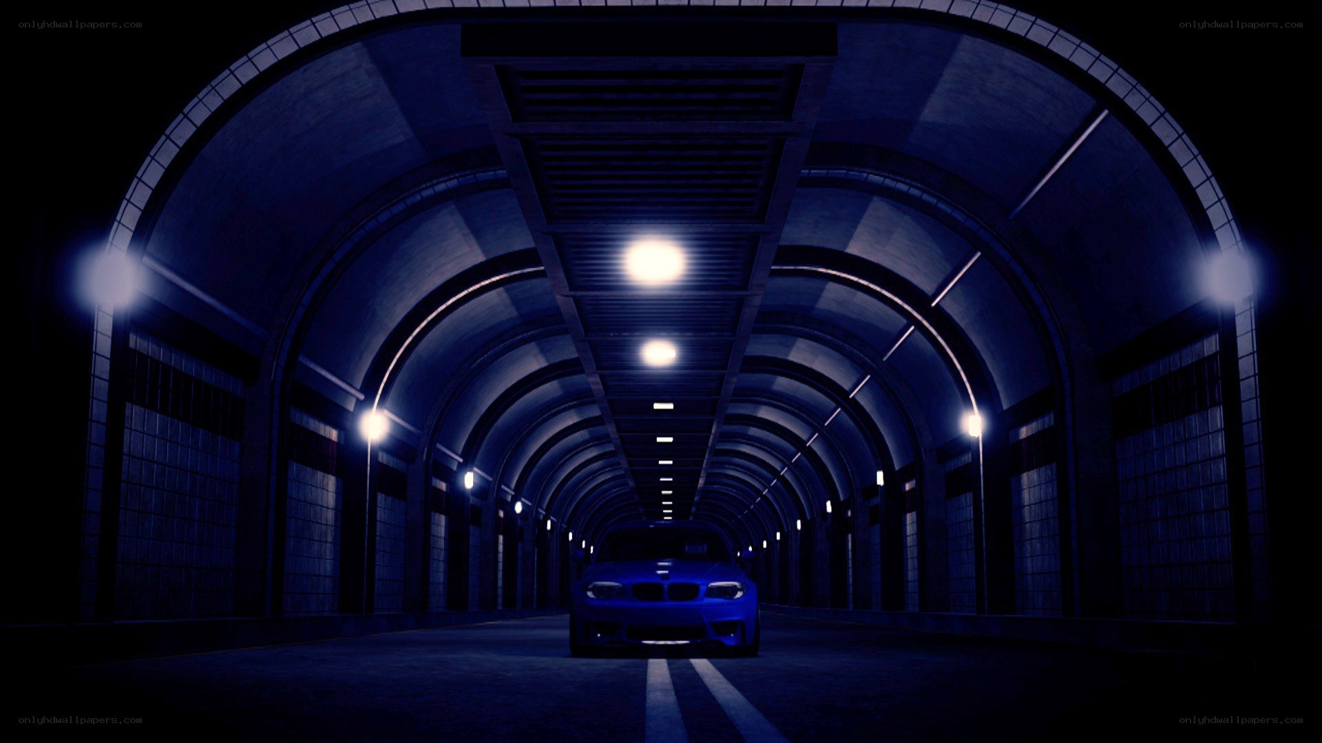 blue car in tunnel