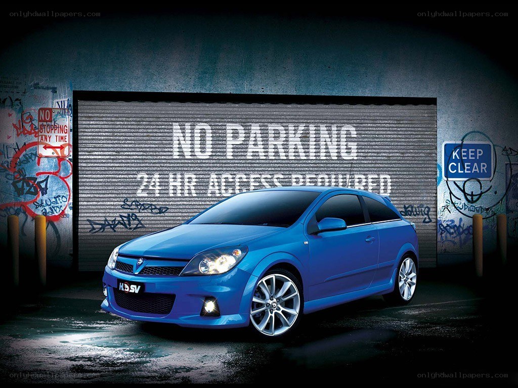 Blue car in urban setting