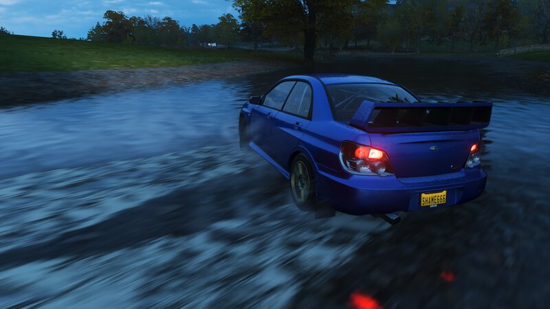 Blue Car in Water — Dramatic