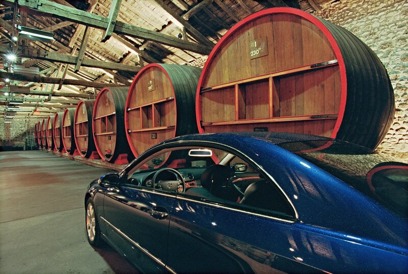 Blue car in wine cellar