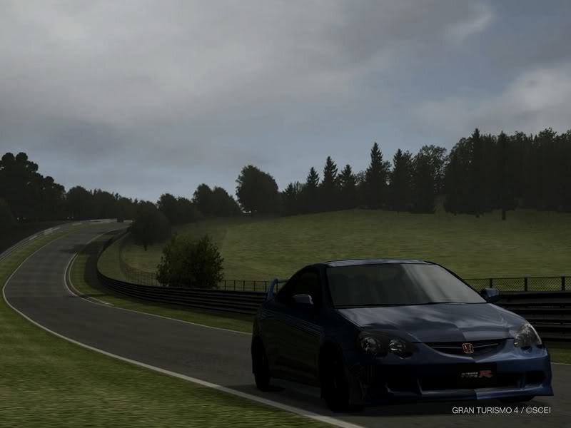 blue car on a racetrack