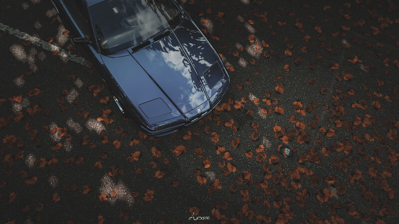 Blue Car on Asphalt — Black