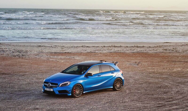 Blue Car on Beach
