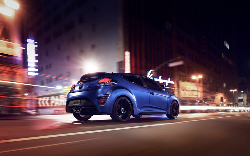 Blue Car on City Street — Dynamic
