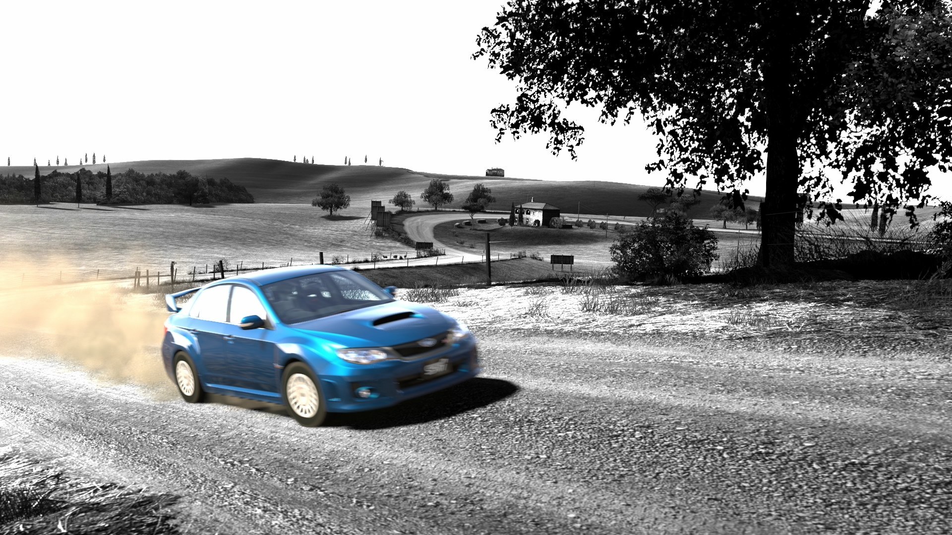 blue car on dirt road
