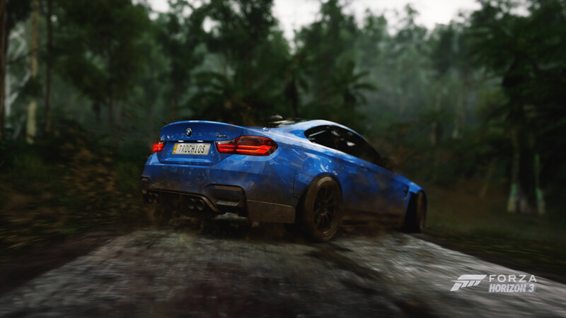 Blue Car on Dirt Road — Dynamic