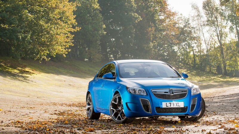 Blue Car on Dirt Road — Serene