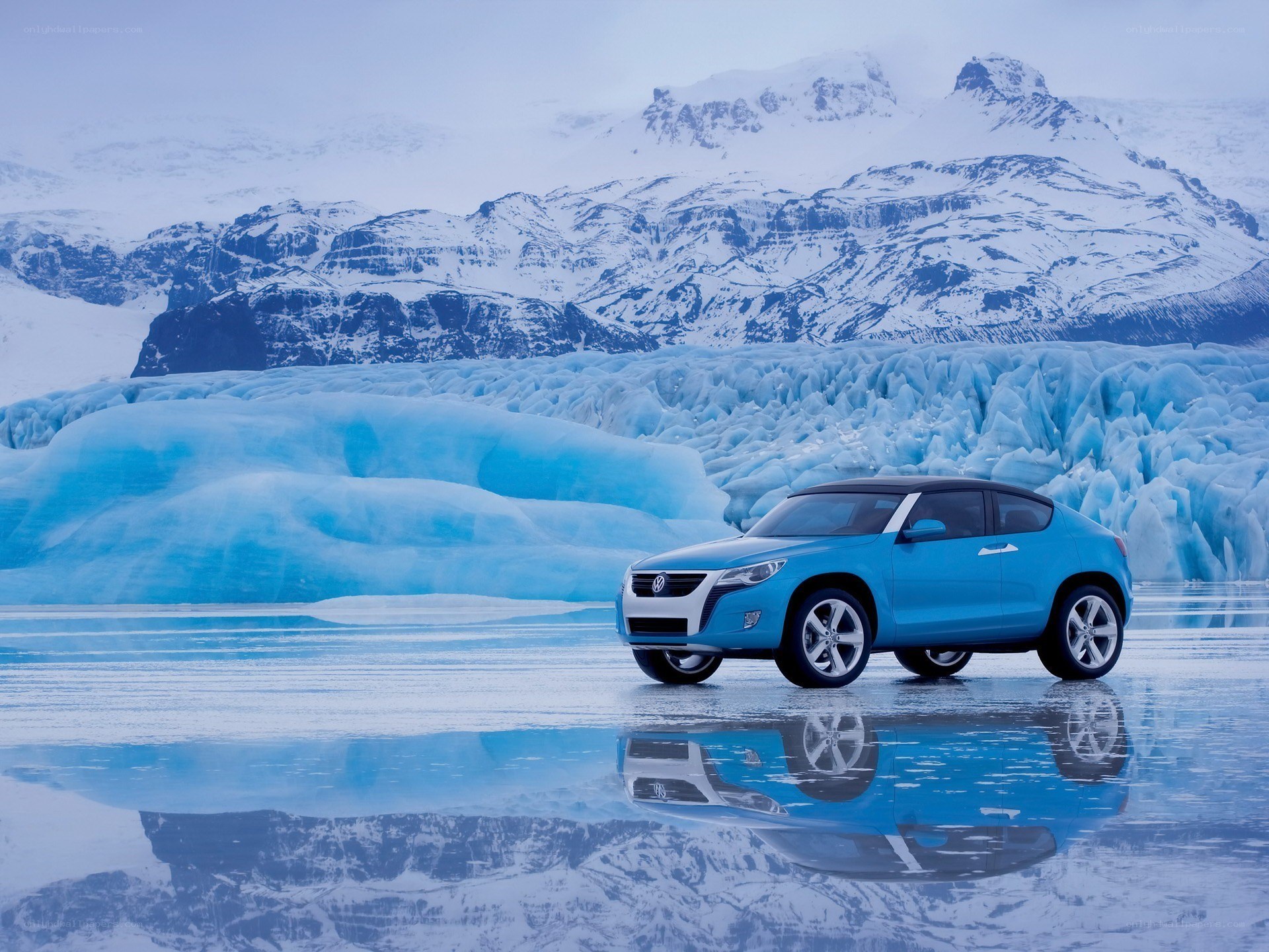 Blue car on icy landscape