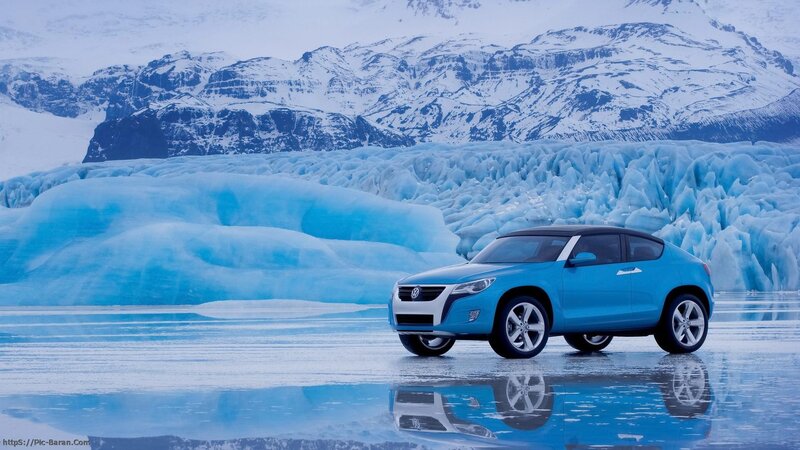 Blue car on icy landscape