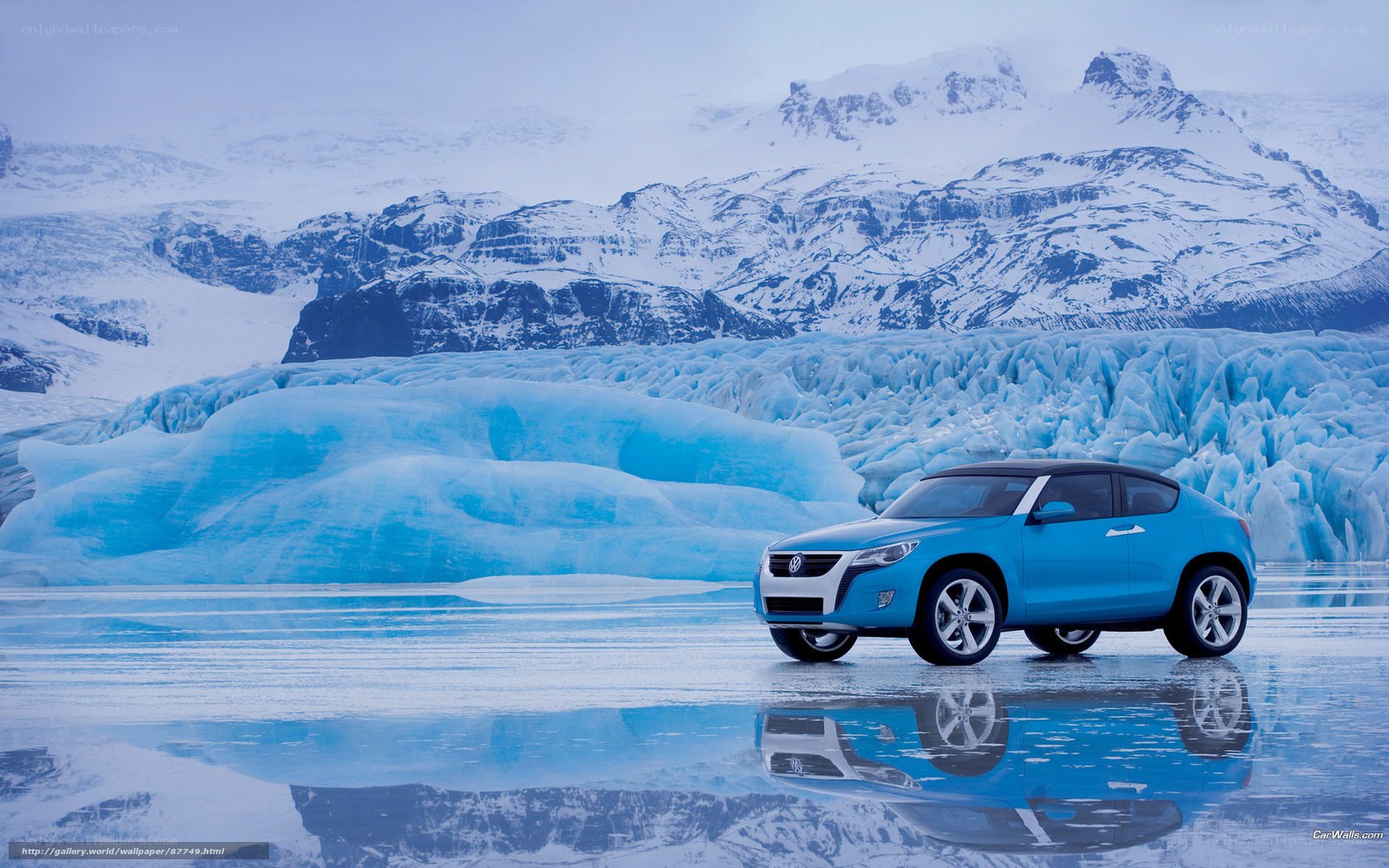 Blue car on icy landscape