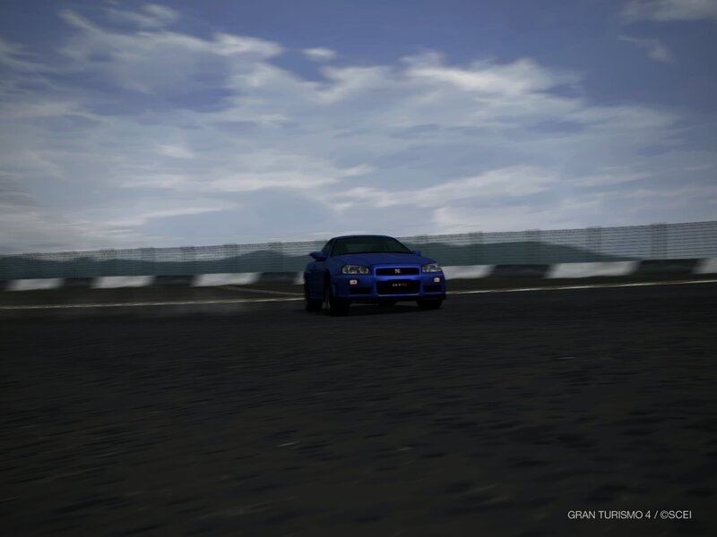 blue car on racetrack