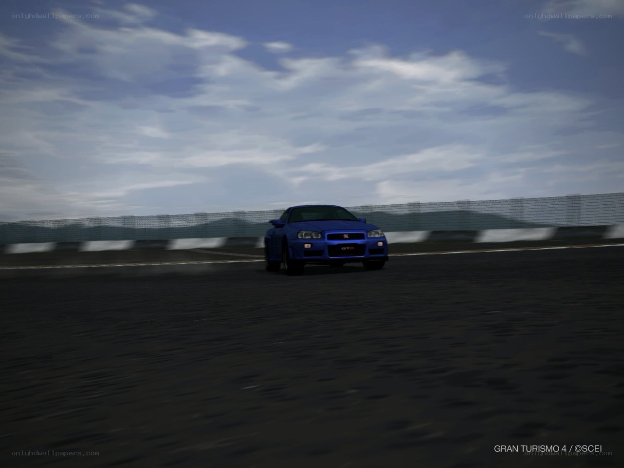 blue car on racetrack