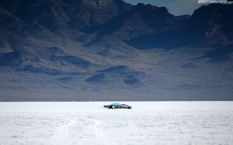 Blue car on salt flat