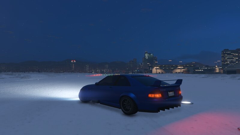 Blue Car on Snow