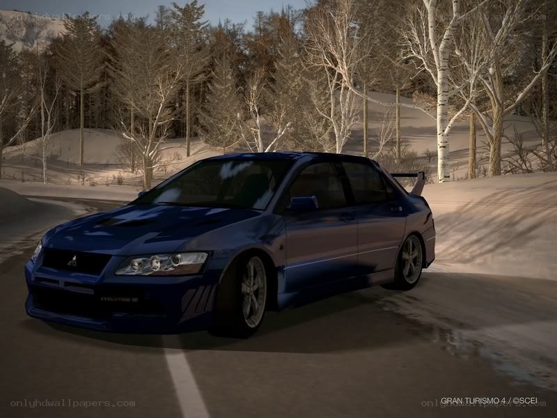 blue car on snowy road