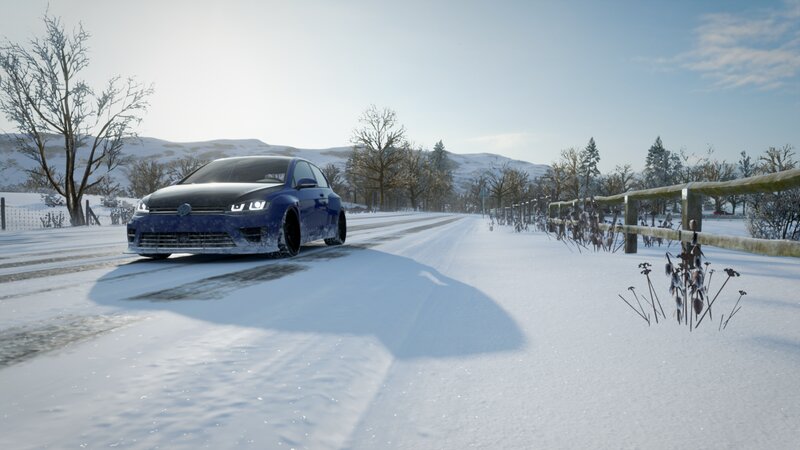 Blue Car on Snowy Road — White