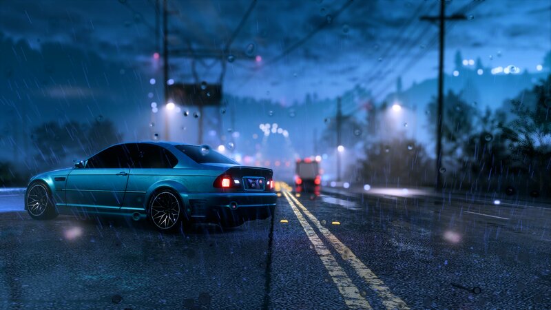 Blue Car on Wet Road