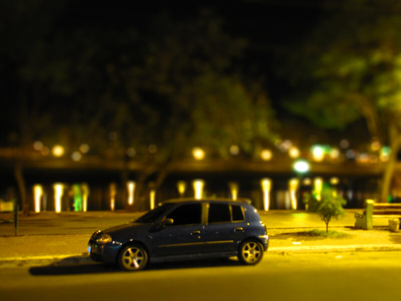 Blue Car Parked at Night — Yellow
