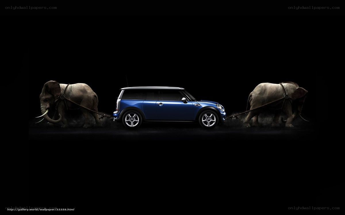 Blue car pulled by elephants