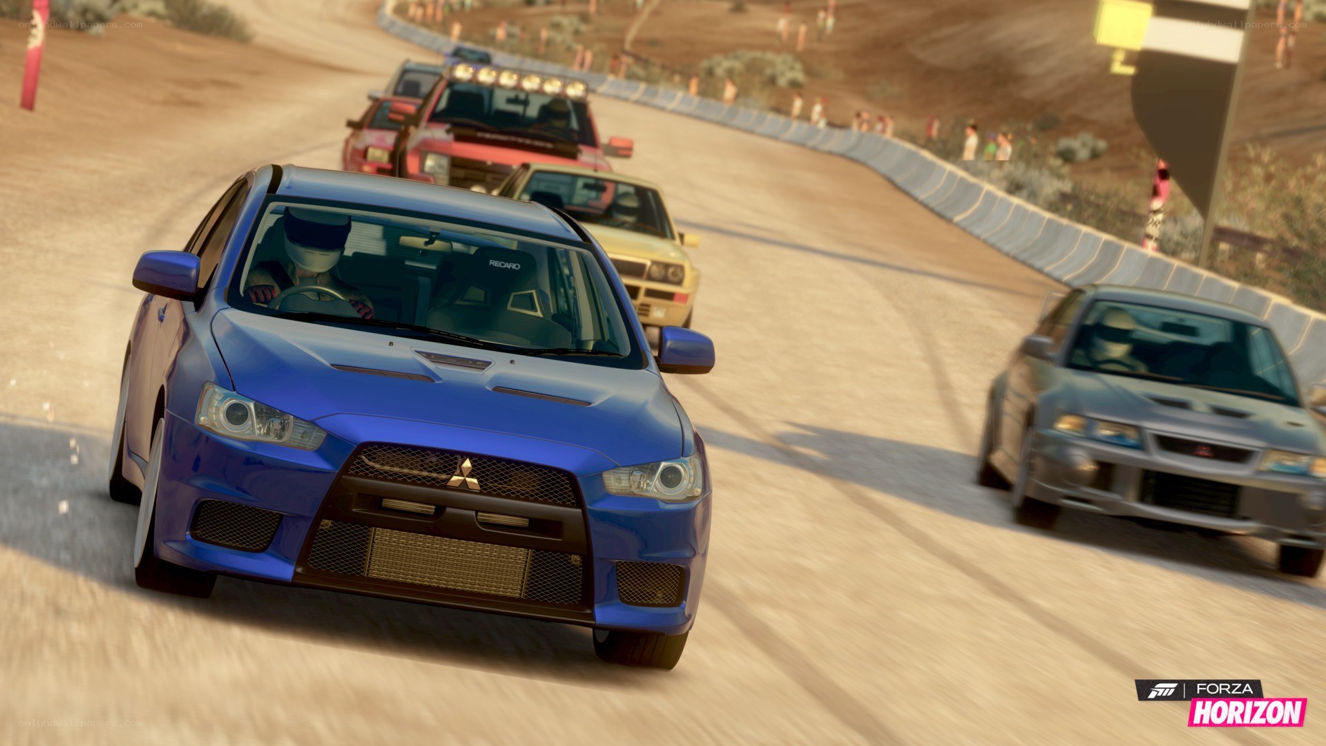 Blue car racing on dirt track