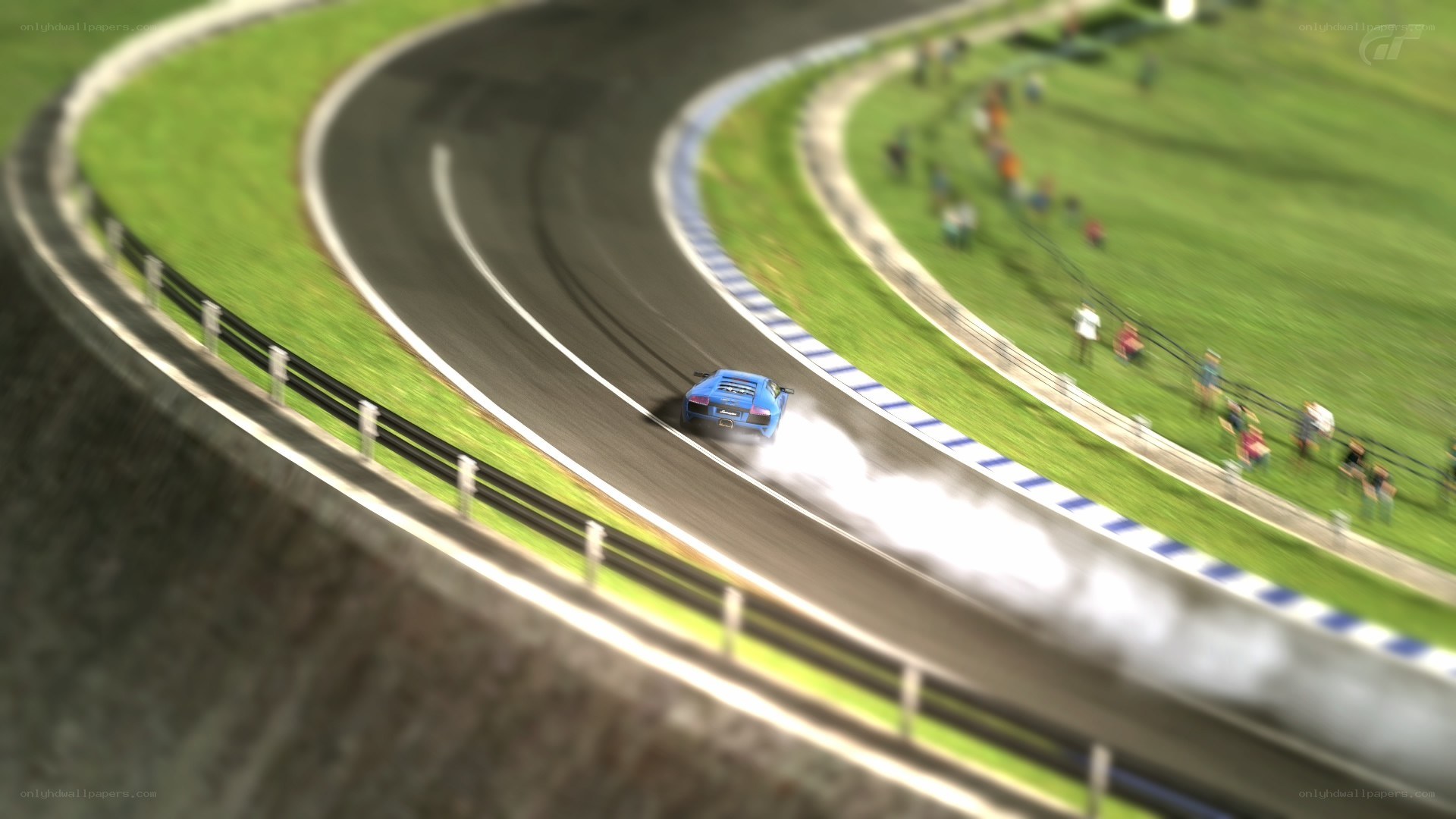 Blue car racing on track