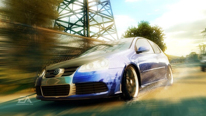 Blue car racing on wet road