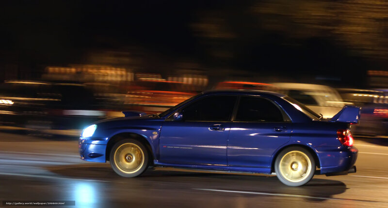 blue car speeding at night