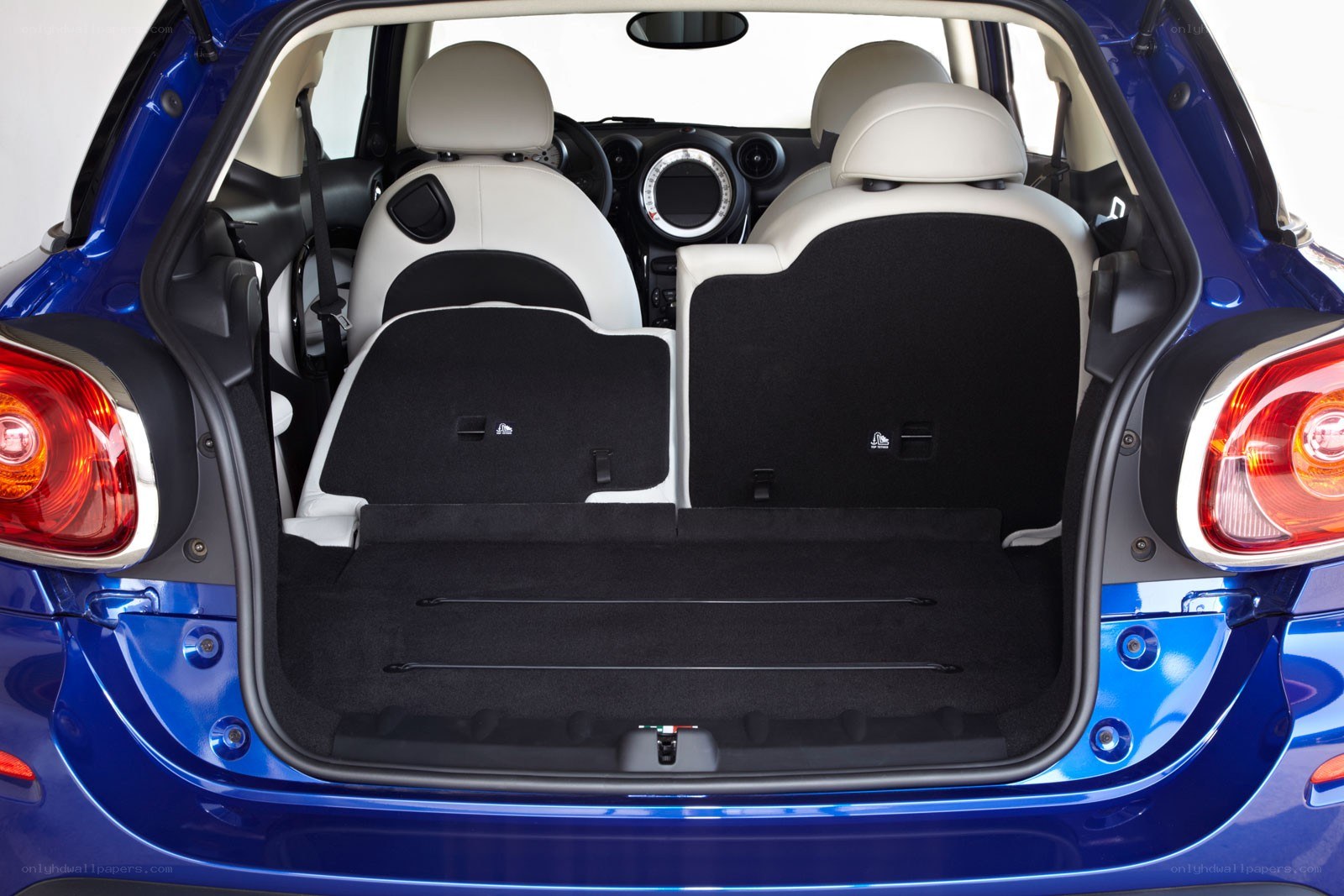 blue car trunk with seats folded