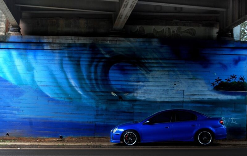 Blue Car under Bridge