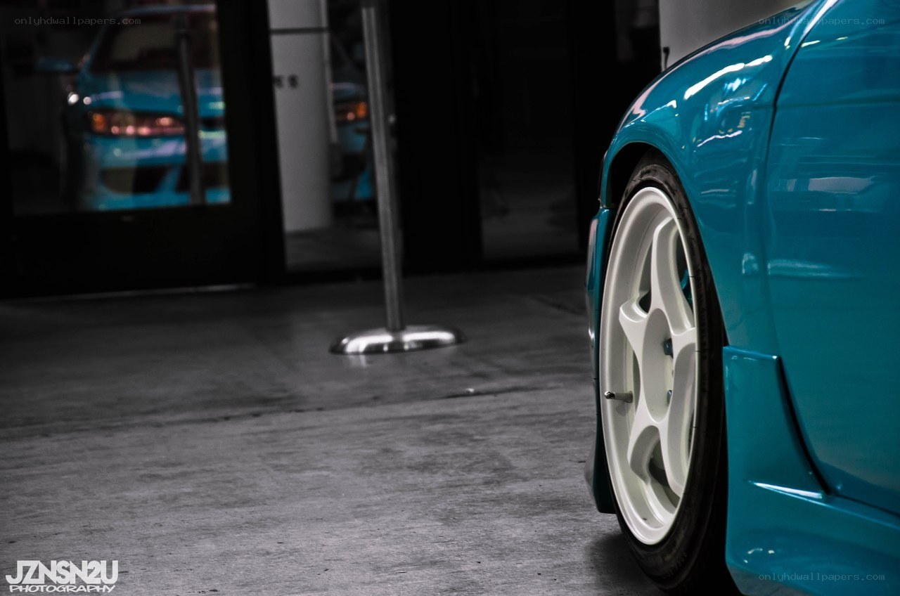 blue car wheel close-up