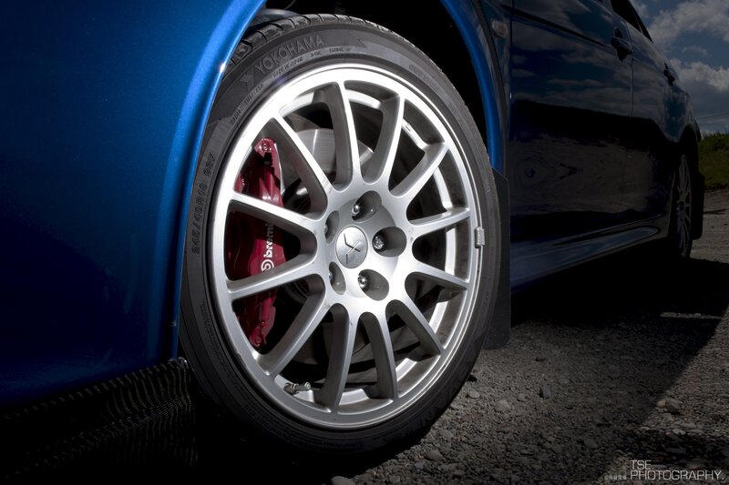 Blue Car Wheel — Dramatic, Afternoon, Photograph, Tire