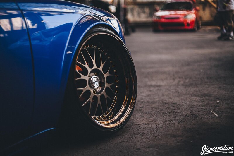Blue Car Wheel — Dramatic, Photograph, Tire