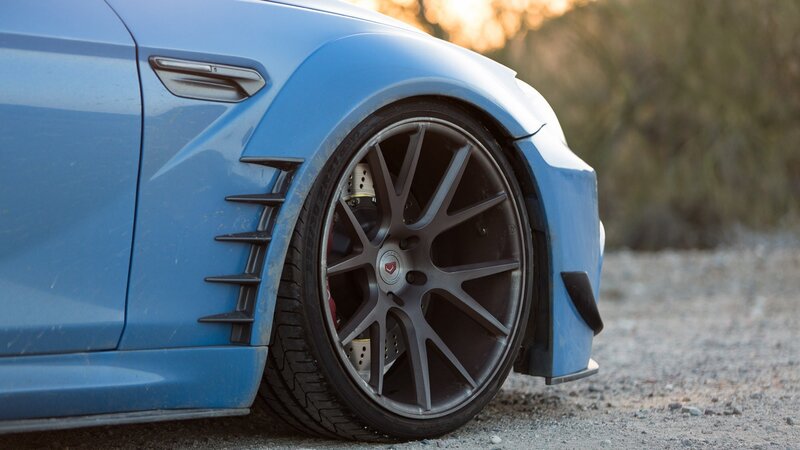 Blue Car Wheel — Dramatic, Sunset