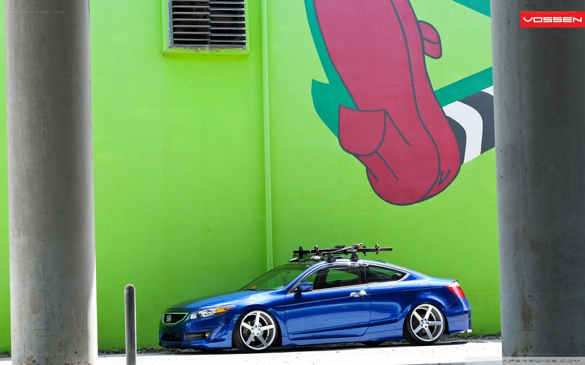 Blue car with bike rack