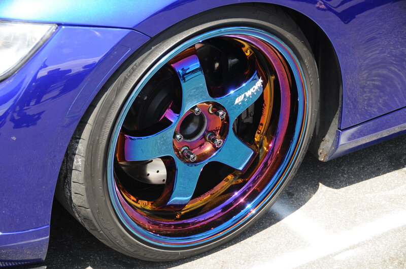 blue car with custom wheels