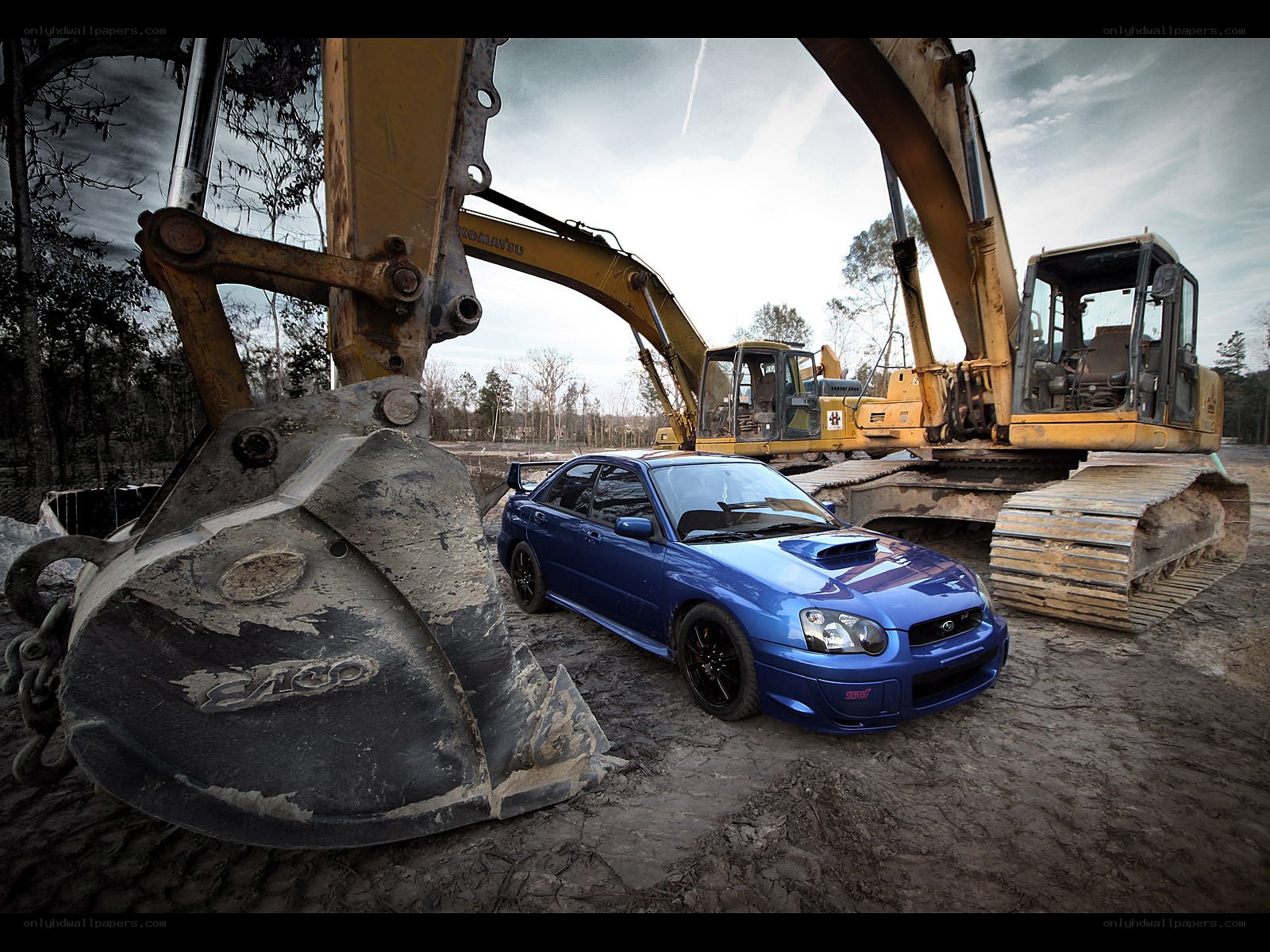 Blue car with excavators