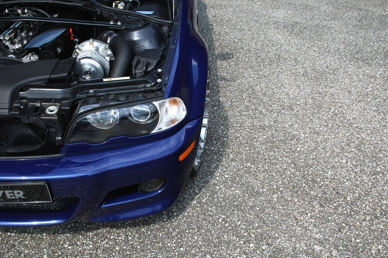 blue car with open hood