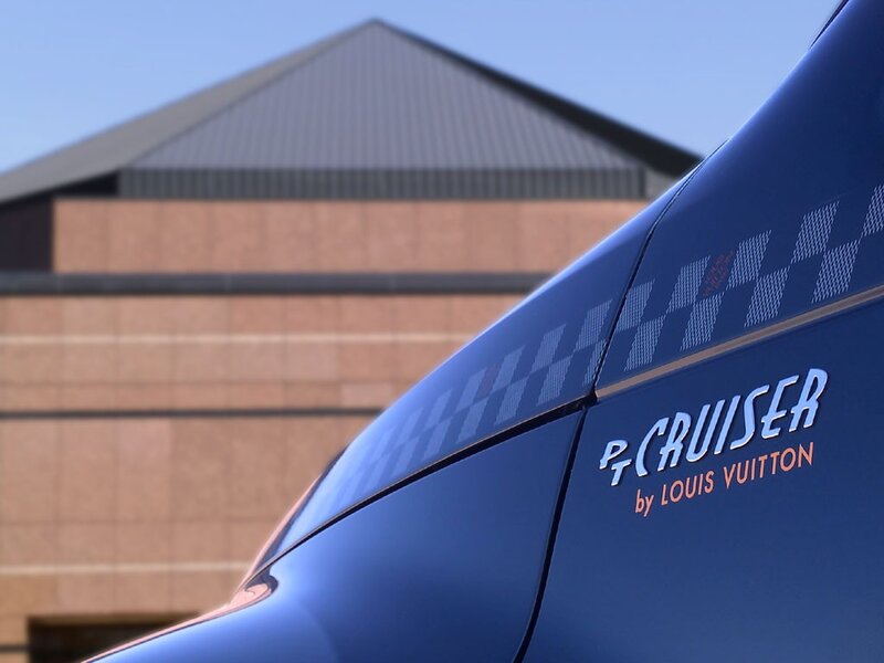 blue car with p-cruiser logo