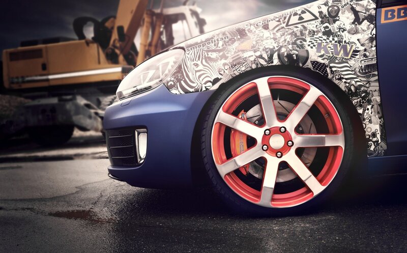 Blue Car with Red Wheels